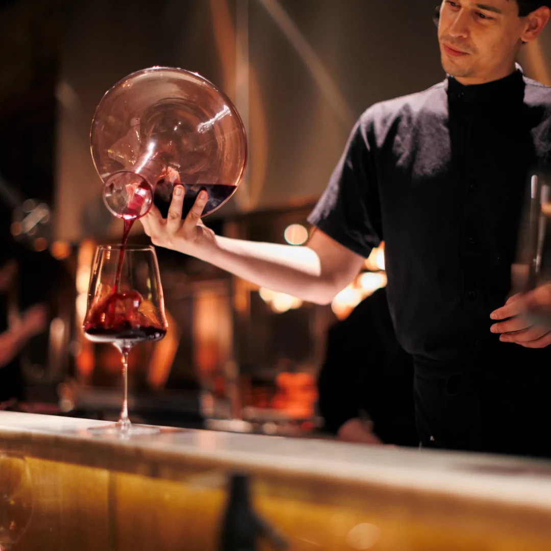 pouring wine for tasting